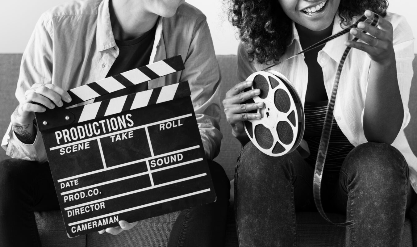 young women with movie film reel